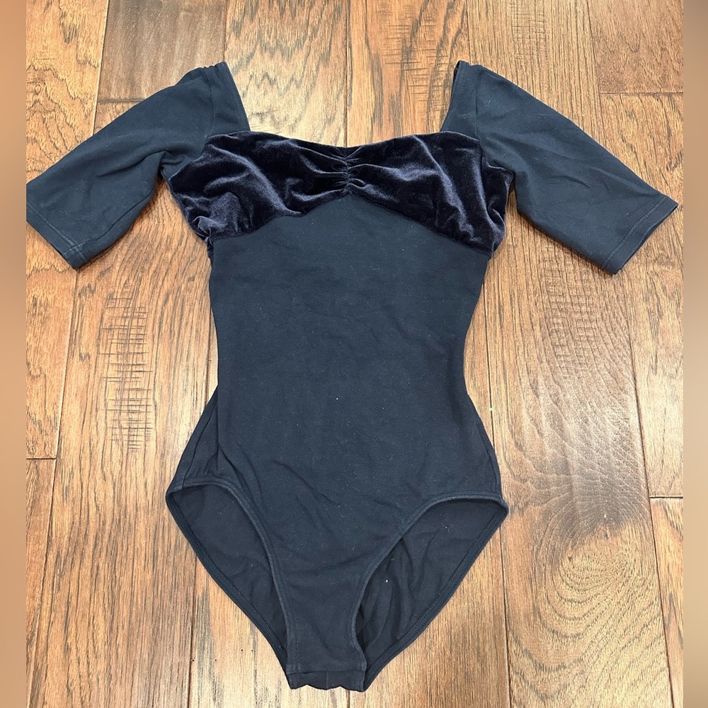 Chacott leotard is navy blue in Size Small.